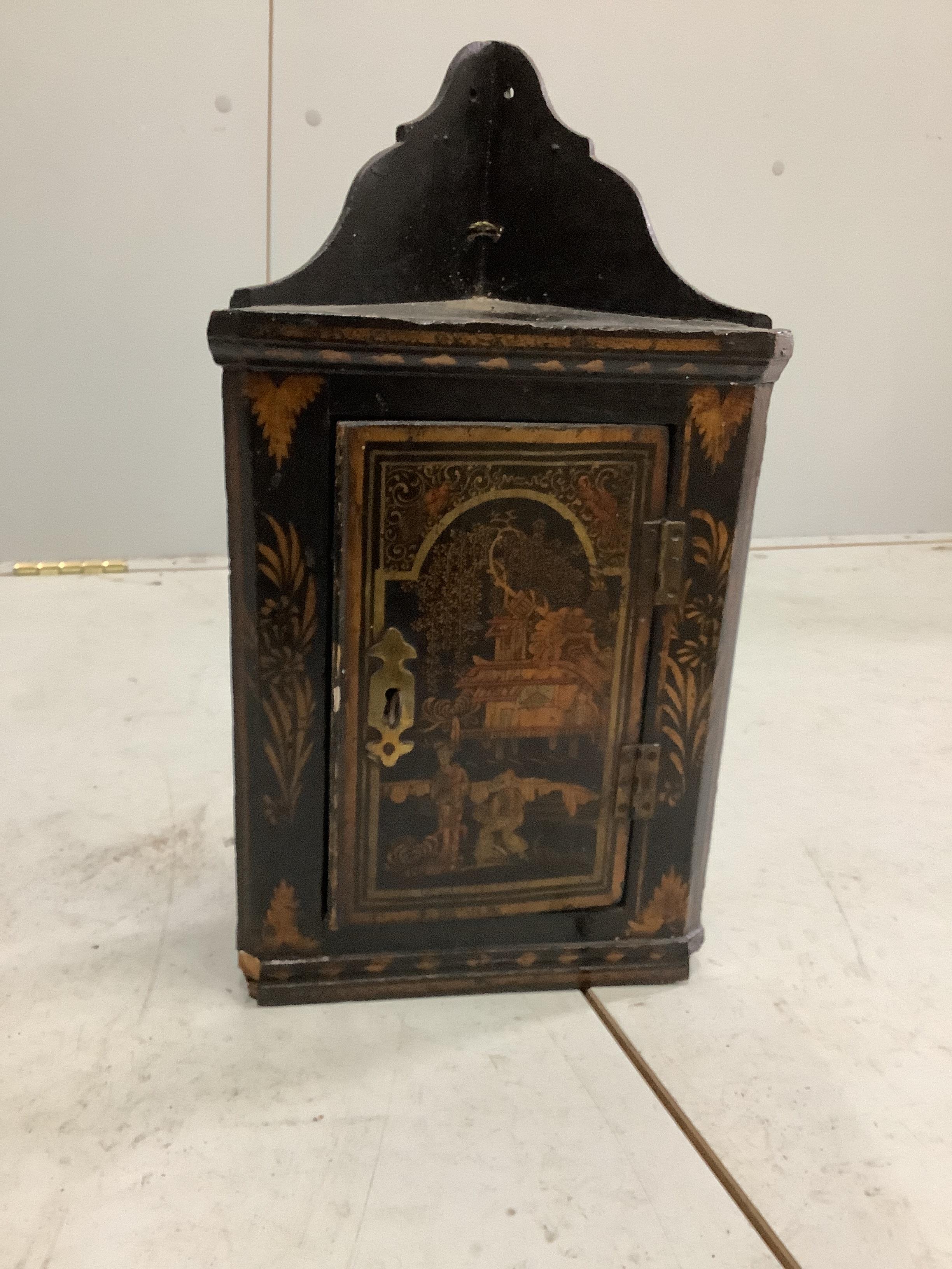 A 19th century chinoiserie lacquer hanging corner cabinet, width 69cm, depth 30cm, height 92cm together with a similar smaller later chinoiserie corner cabinet